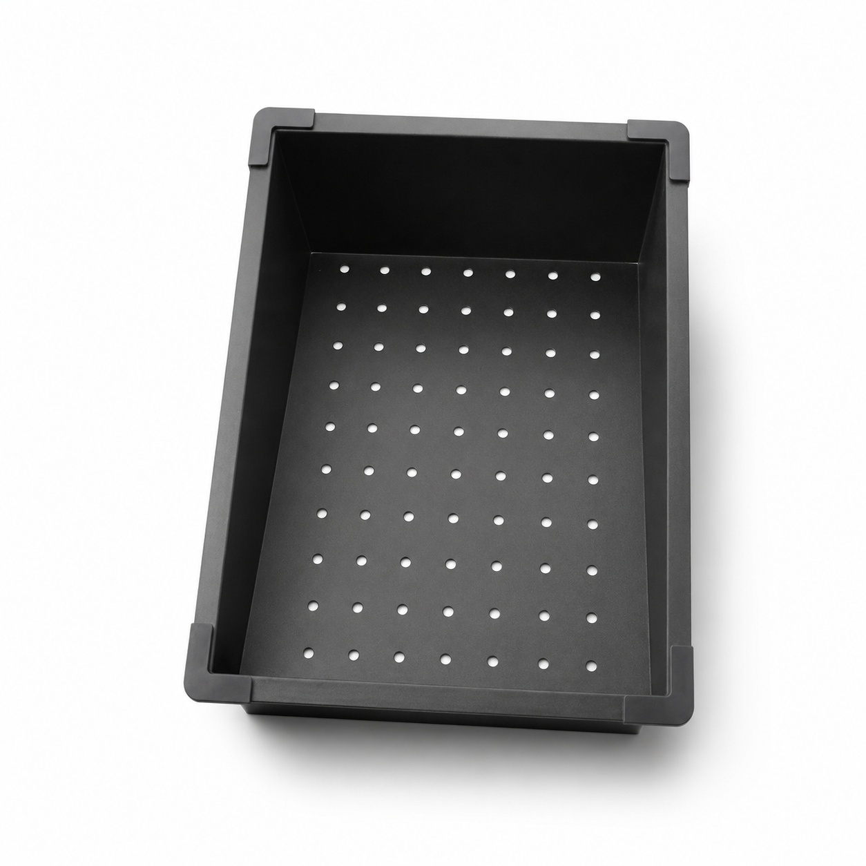 Angled view of black sink drainer basket designed for washing fruits and vegetables.