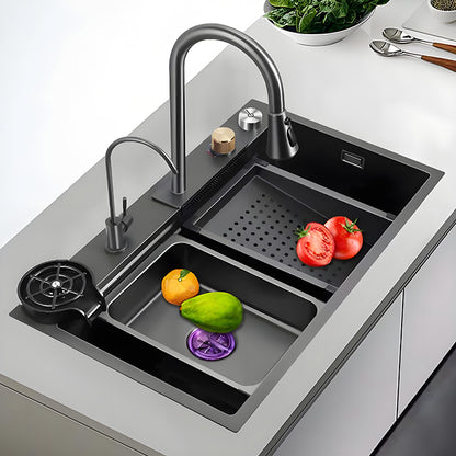 Black and gray multifunctional stainless steel workstation kitchen sink with high-arc faucet, auxiliary faucet, cup washer, inner basin, perforated drain tray, and vegetable washing area.