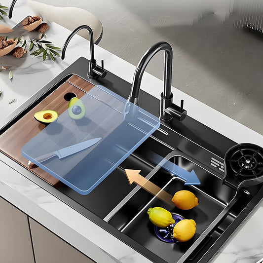 Black multifunctional workstation kitchen sink with wooden cutting board, movable inner basin, dual faucet setup, and sliding accessory system for washing and food preparation.