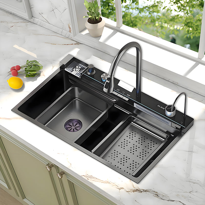 Black smart waterfall stainless steel workstation kitchen sink installed beside a window with high-arc faucet, inner basin, perforated drain tray, auxiliary faucet, and rear control deck.