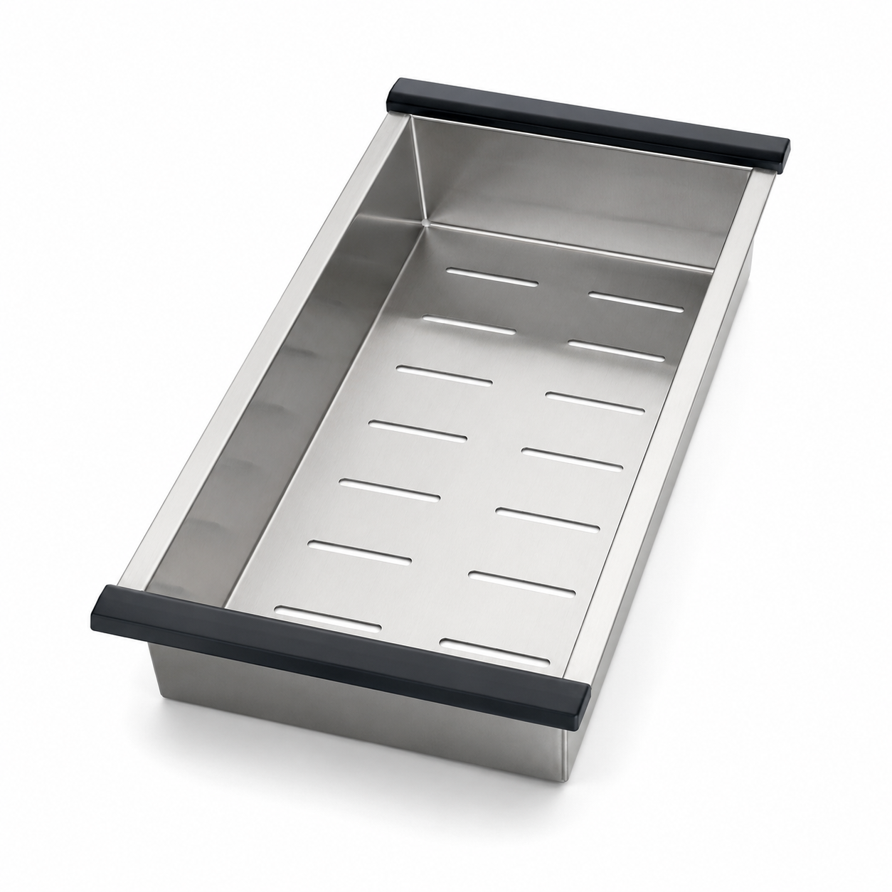Brushed stainless steel sink strainer basin with black end grips, raised side walls, and slotted drainage bottom for washing vegetables over a kitchen sink.