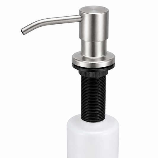 Close-up view of a brushed stainless steel sink soap dispenser with fixed spout, threaded mounting body, and refill bottle for dish soap use.