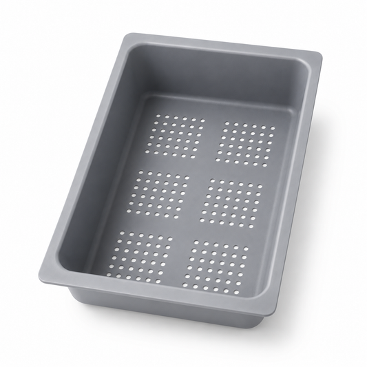 Grey ABS sink strainer basin with raised side walls and grouped round drainage holes, designed for washing vegetables on a stainless steel kitchen sink.