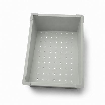 Grey drainer basket for workstation sink shown in front angled view.