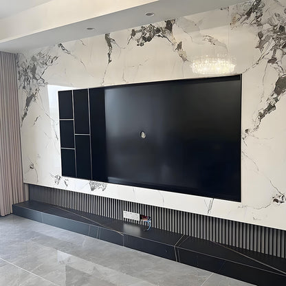 Nicho de parede embutido para TV em aço inoxidável sob medida, com design moderno e armazenamento integrado.