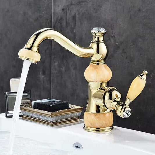 Luxury golden basin faucet with single handle, modern design and polished surface, stylish bathroom or kitchen upgrade.