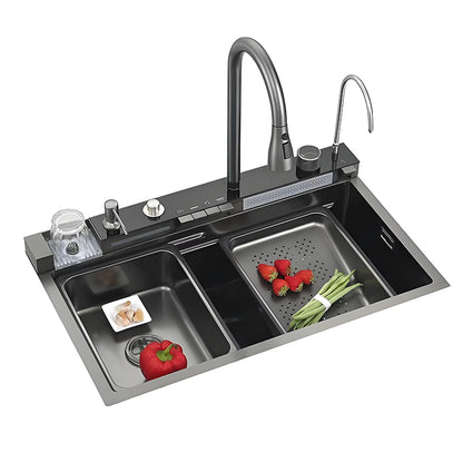 Multi-hole stainless steel waterfall workstation kitchen sink with high-arc faucet, cup washer, auxiliary faucet, control buttons, drain basket, and vegetables in a double-zone sink layout.