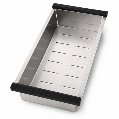 Rectangular stainless steel over-sink strainer tray with long bottom drain slots, brushed finish, deep side walls, and black support grips on both ends.