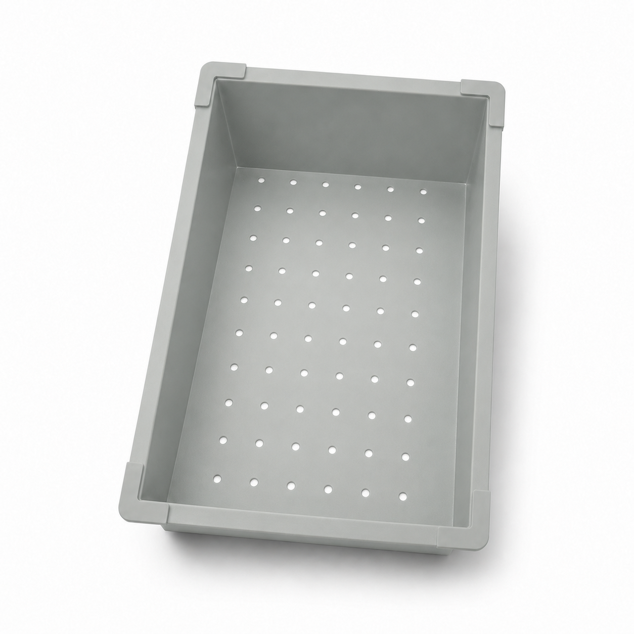 Silver metal drainer basket for multifunctional sink with drainage holes and corner supports.