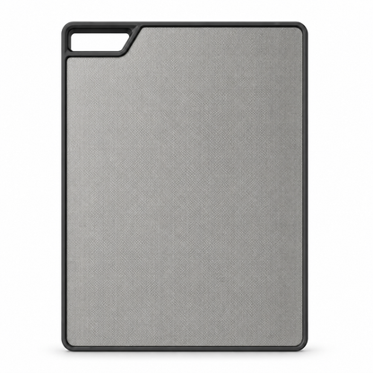 Stainless steel side of the sliding kitchen sink cutting board with textured metal surface, black edge frame, and handle opening for multifunction sink accessories.