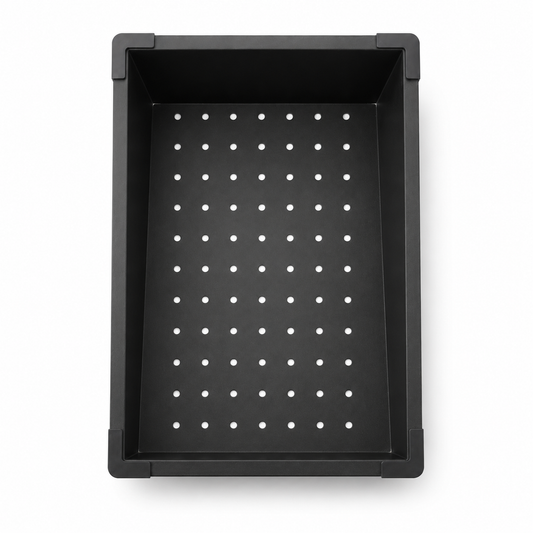Top view of black filter basin for multifunctional sink with evenly distributed drain holes.